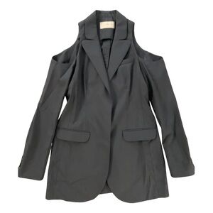 100% wool black Christopher Kane blazer with cutouts. 100% silk lining. Size US8